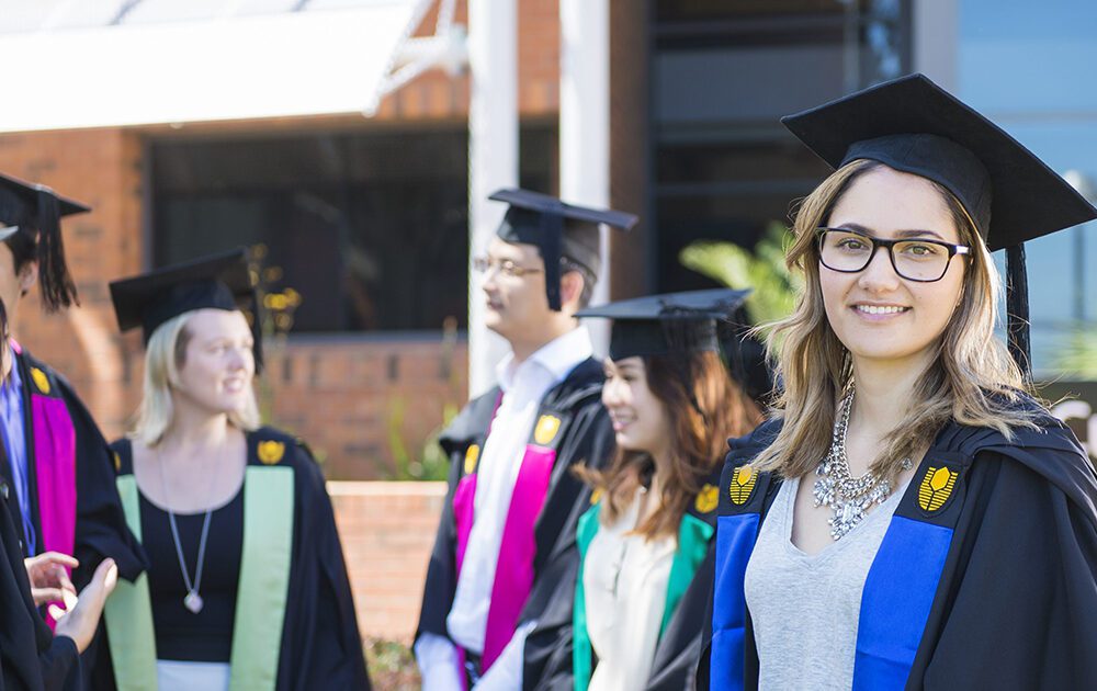 Curtin student with friends at graduation