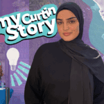 A student, Zehrah, stands smiling at the camera surrounded by different graphic elements that represent her journey. The text 