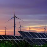 Solar photovoltaic panels and wind turbines. Energy concept