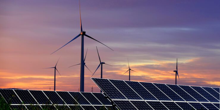 Solar photovoltaic panels and wind turbines. Energy concept