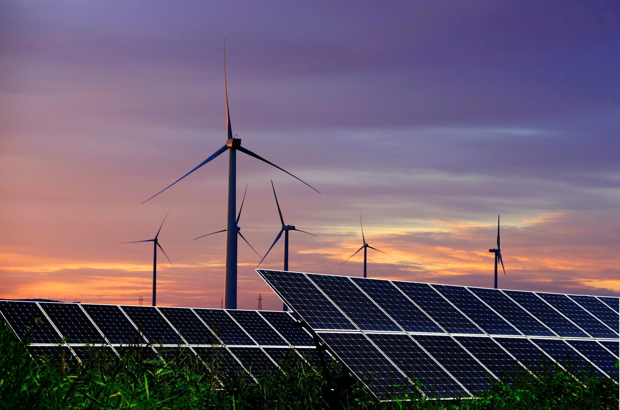 Solar photovoltaic panels and wind turbines. Energy concept