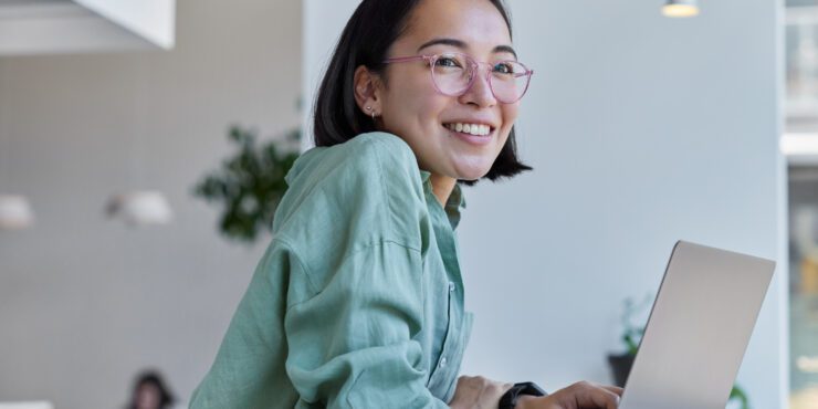 Young woman at laptop.