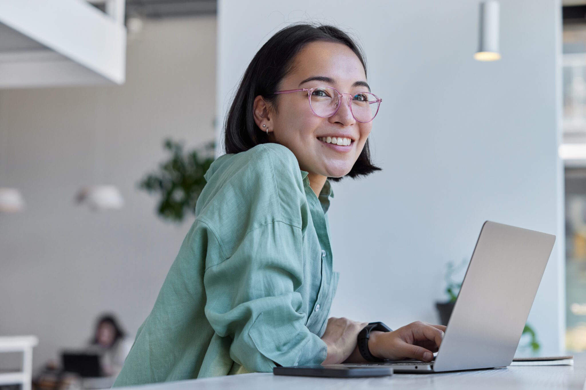 Young woman at laptop.