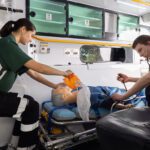 Two Curtin paramedic students working in the 'simbulance'
