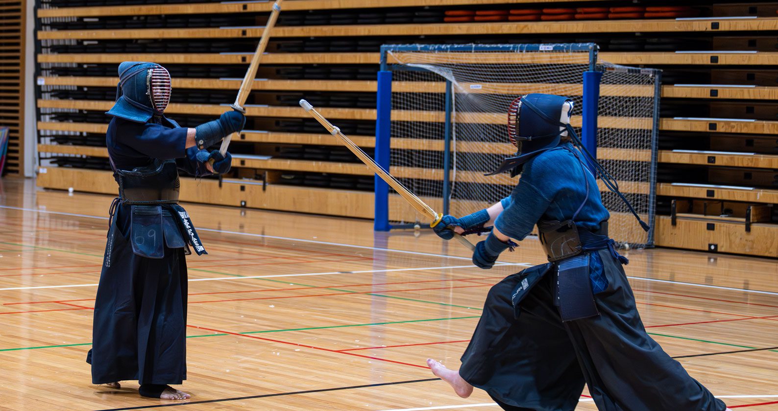 Two students fencing.