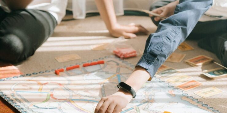 Students playing a board game