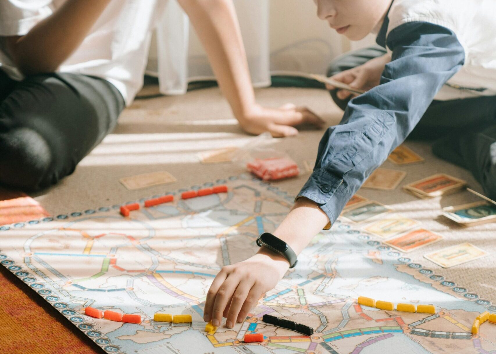 Students playing a board game