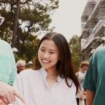 three students walking next to each other