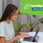 Person on laptop and headspace logo