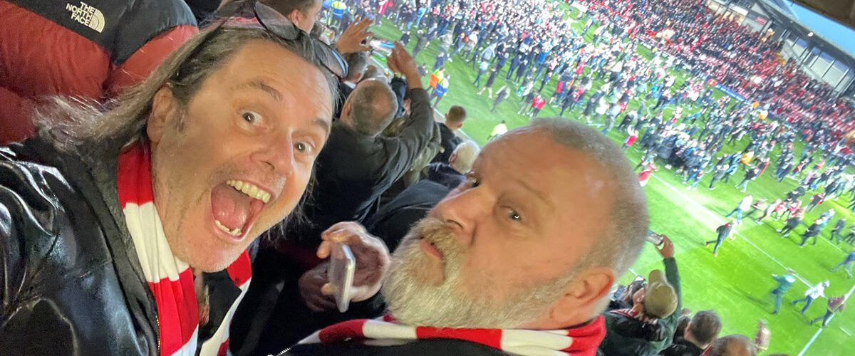 Kit with his oldest friend from Wales, the late Tim Hayman, at Wrexham AFC’s 3-1 victory over Boreham Wood at the Cae Ras, Wrexham, April 2023.