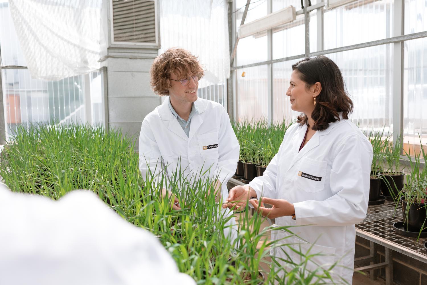 Ag researchers in lab coats