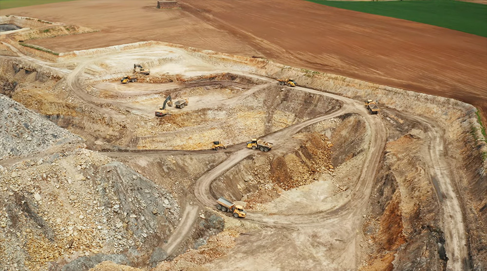 Aerial shot of mine site - play video