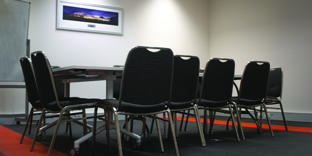 Seminar room with chairs around a table