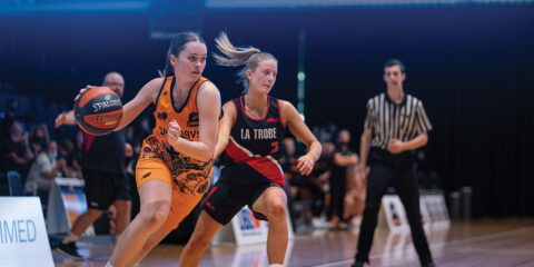 Curtin athlete playing basketball against La Trobe University