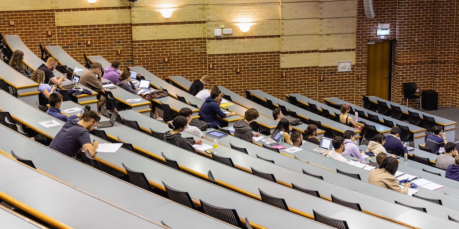 Students sitting in a lecture theatre