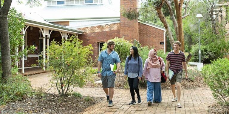 Four students walking around Curtin Kalgoorlie