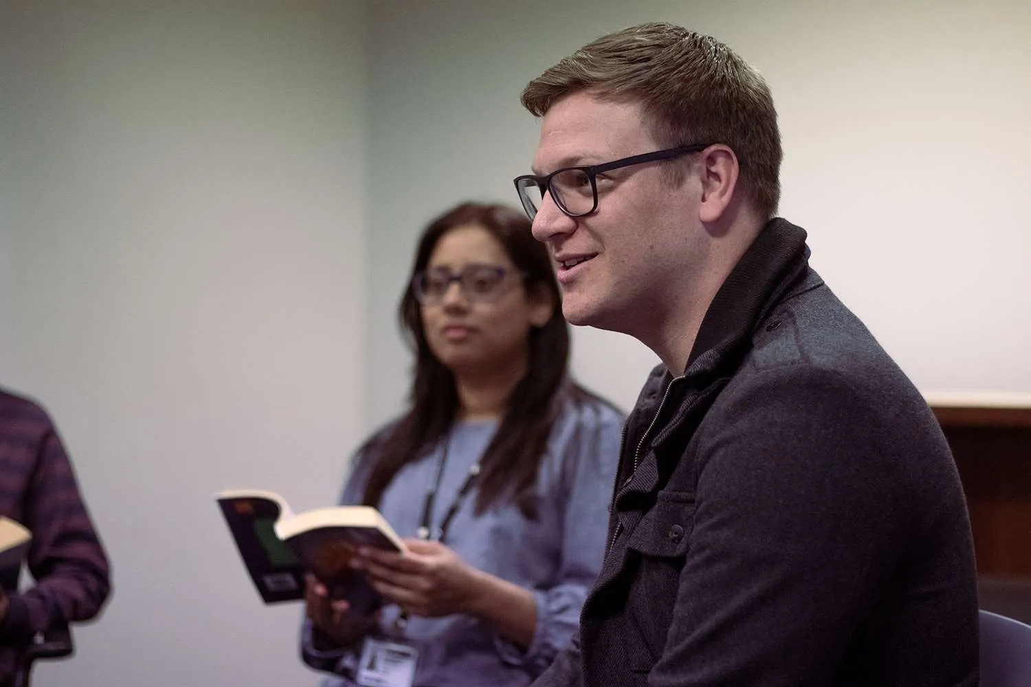 Two people sitting inside