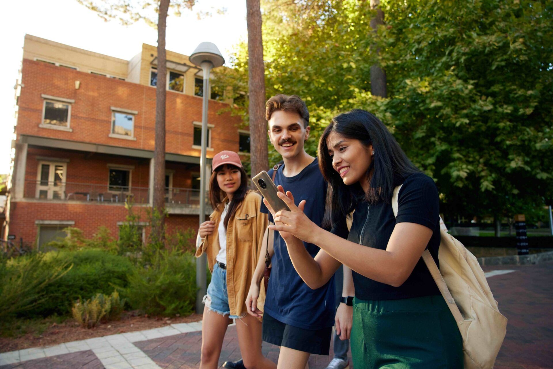 Students walking together on campus.