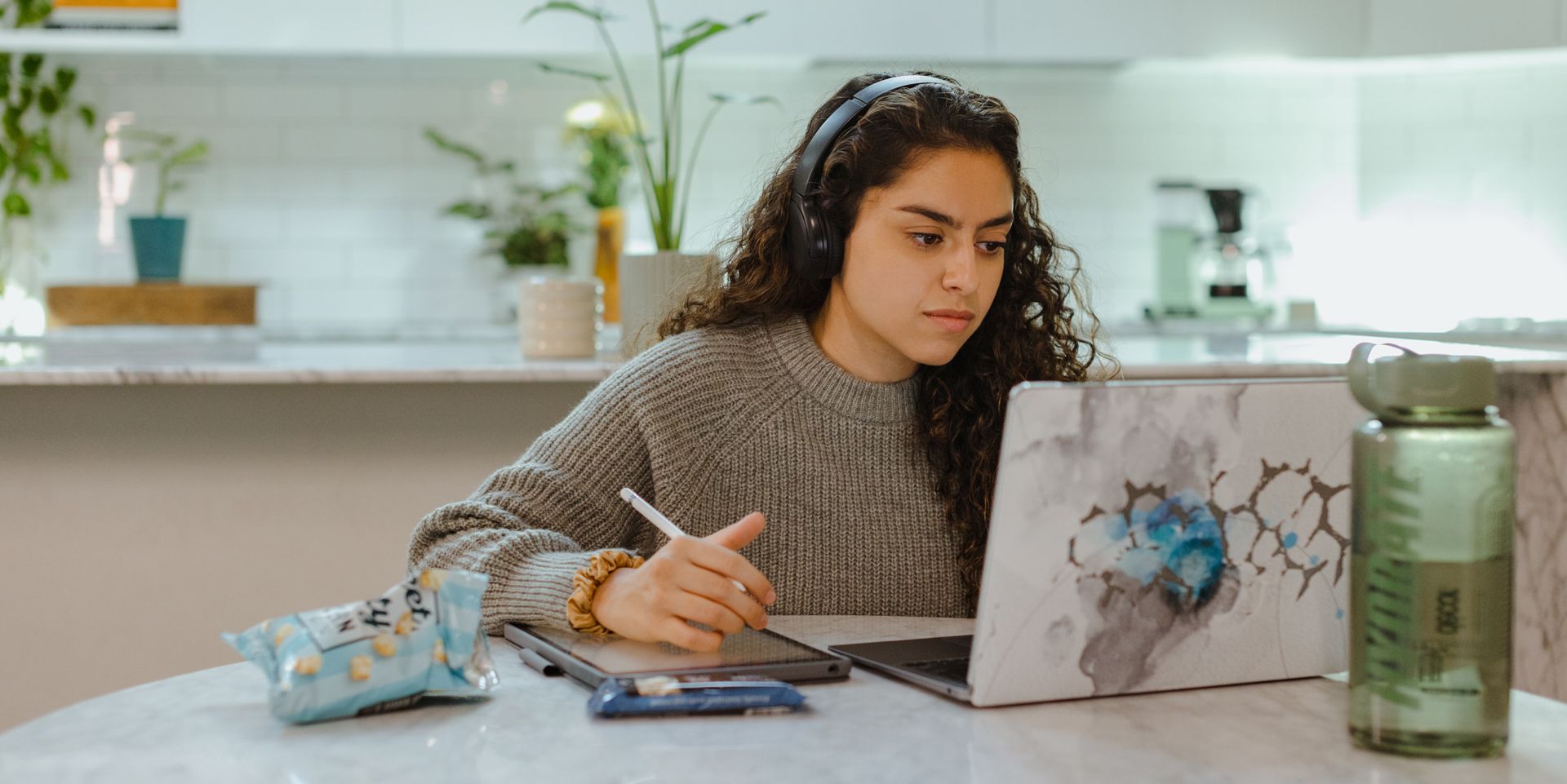 Student using their laptop at home.