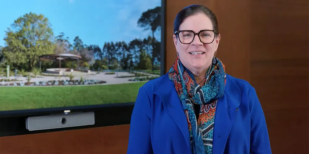 Vice Chancellor Harlene Hayne standing in an office on campus. - play video