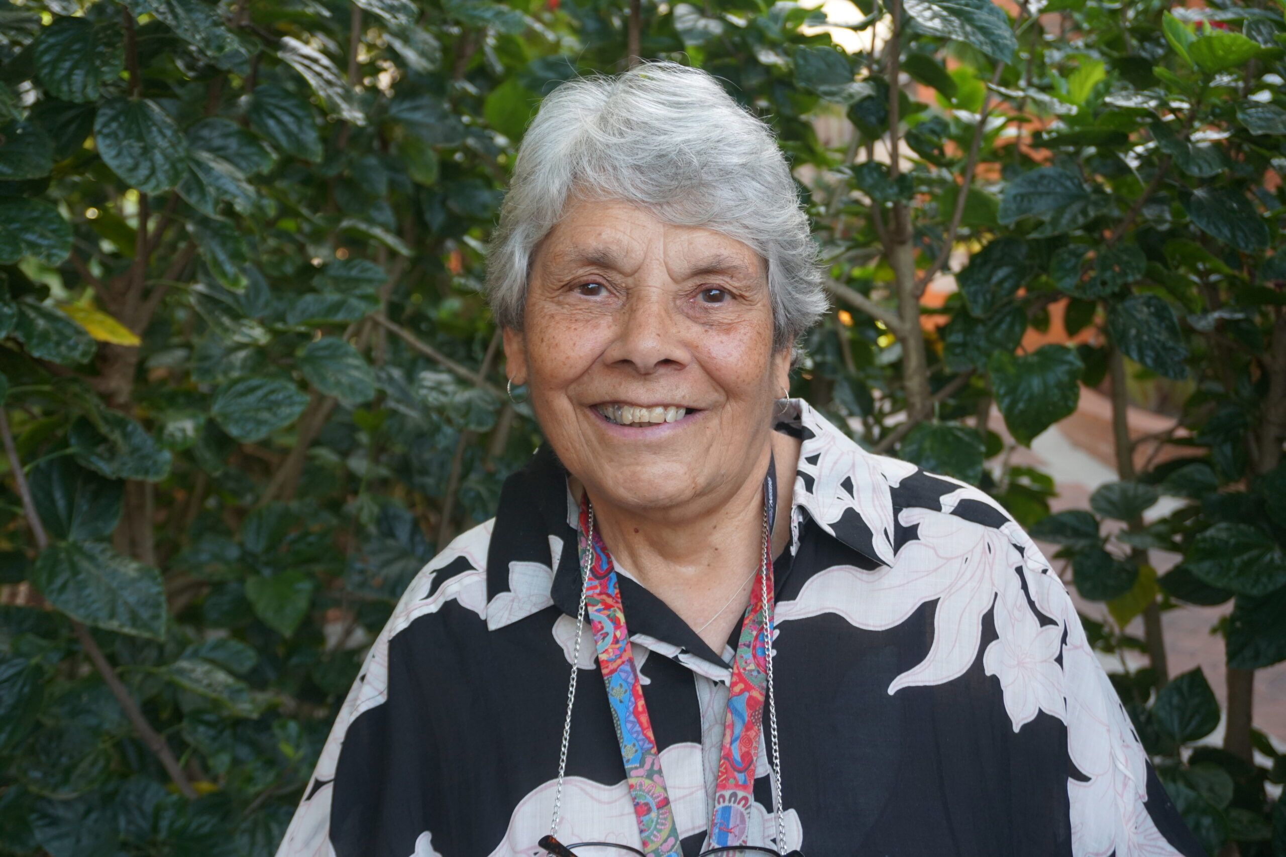 Joyleen smiles stand outdoors