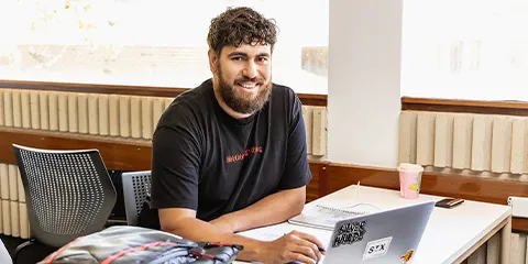 Student working on their laptop.