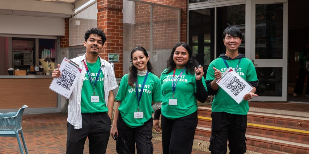 Four Curtin Mentors stood with QR codes