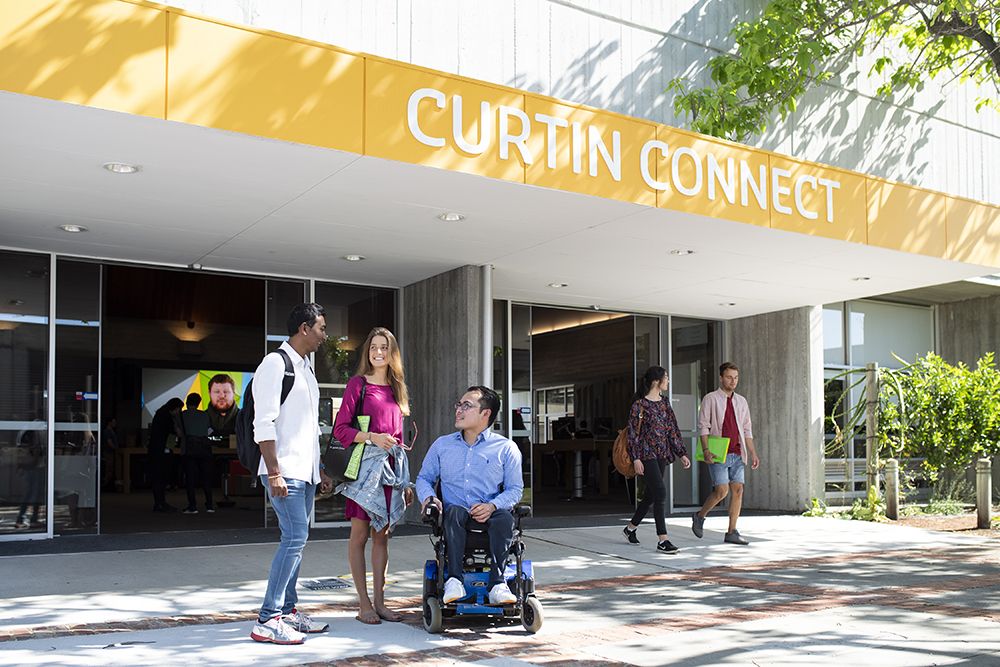 Three students outside of Curtin Connect