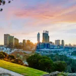 Cityscape of Perth Western Australia as the sun rises. The photo was taken in Kings Park