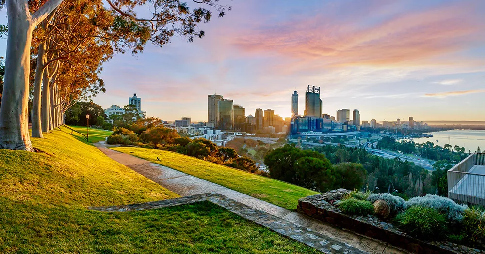 Cityscape of Perth Western Australia as the sun rises over Kings Park