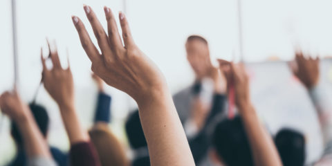 Hands raised in the air