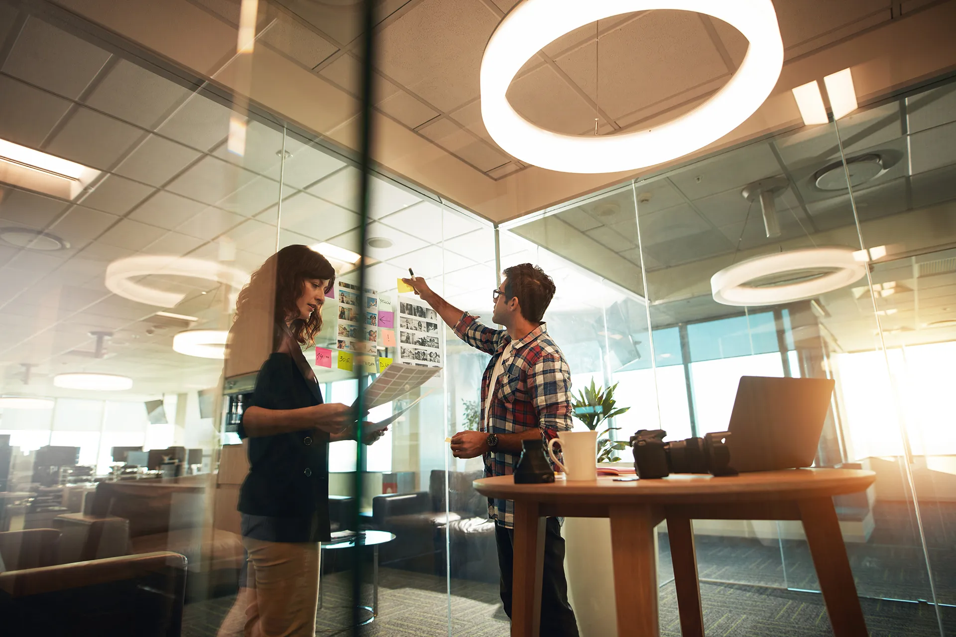 Two photographers in a modern office