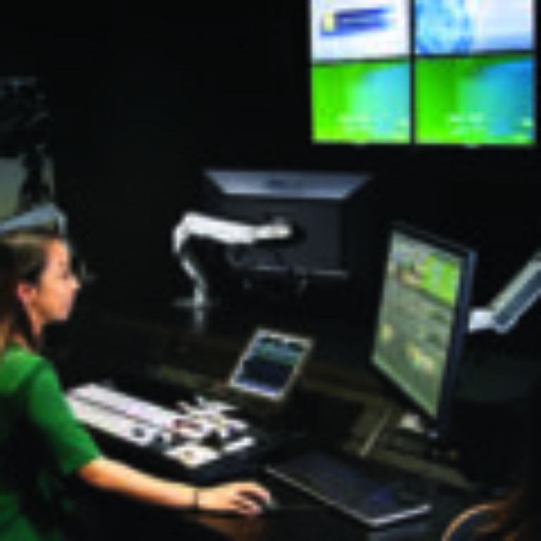 A young female sitting in a media centre