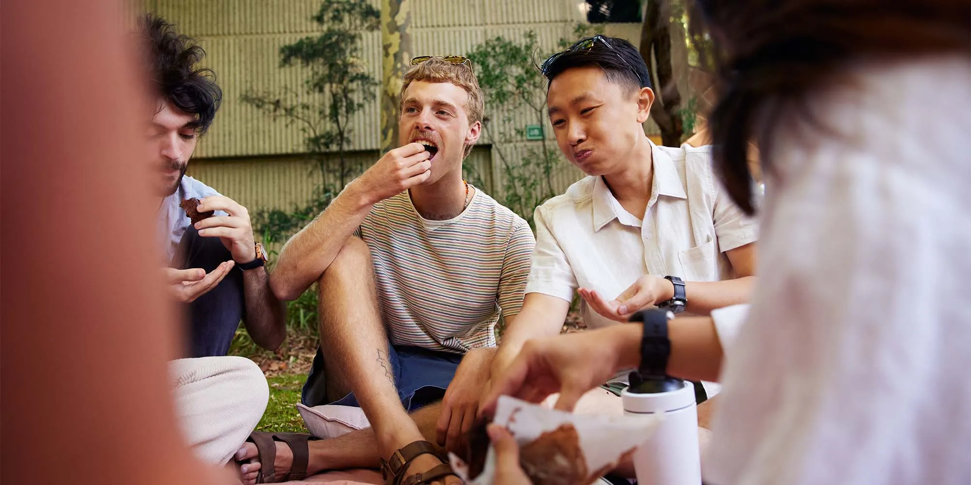 Students eating different foods on campus