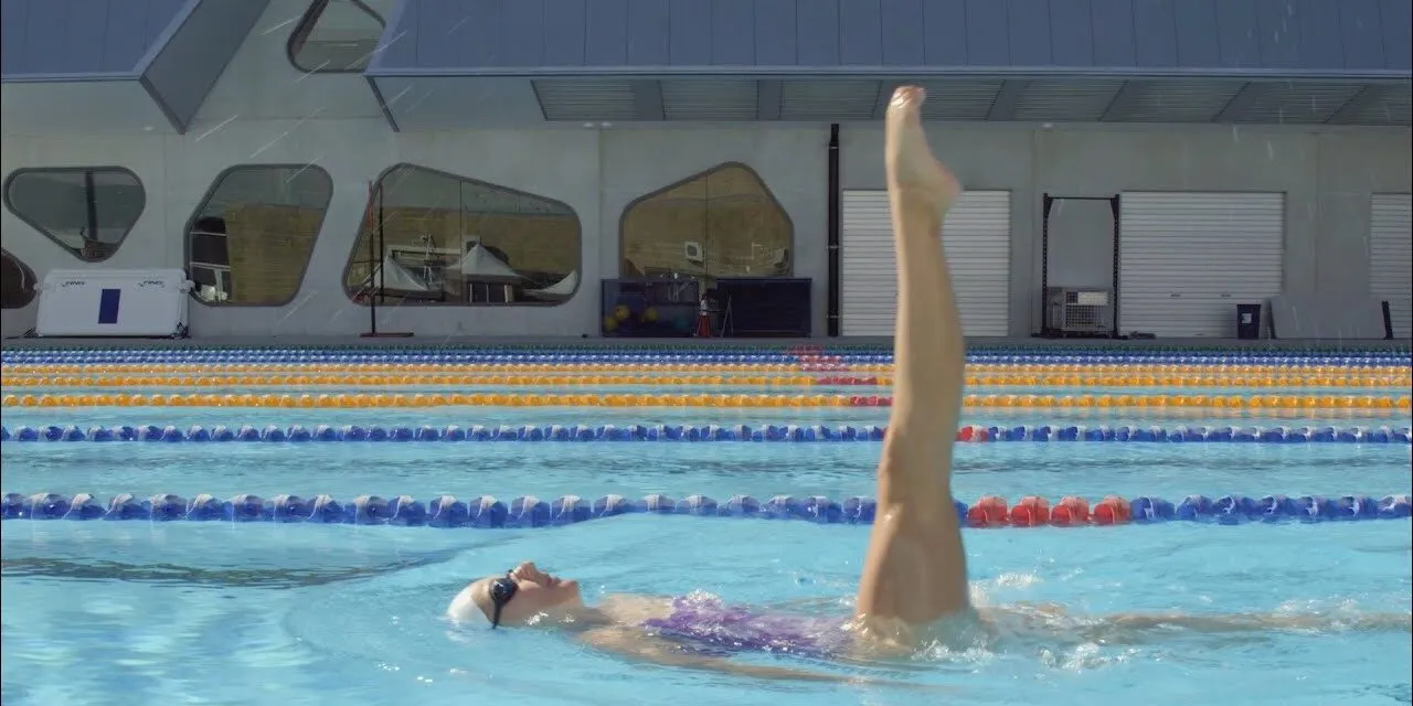 Student swimming - play video