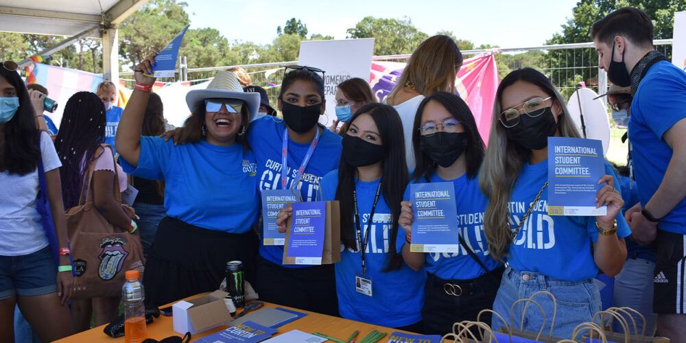 Students wearing Guild shirts at an event