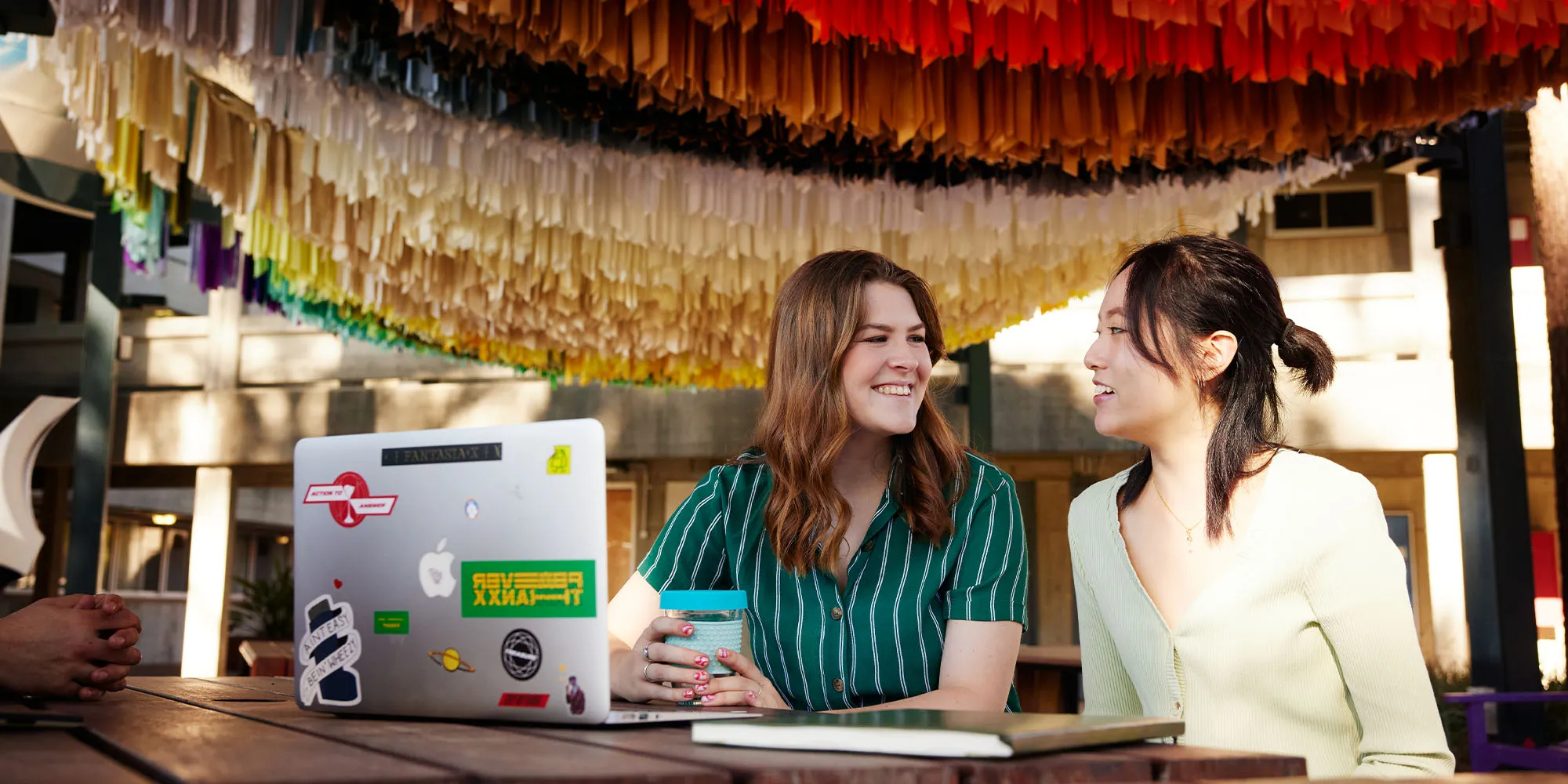 Two students getting coffee