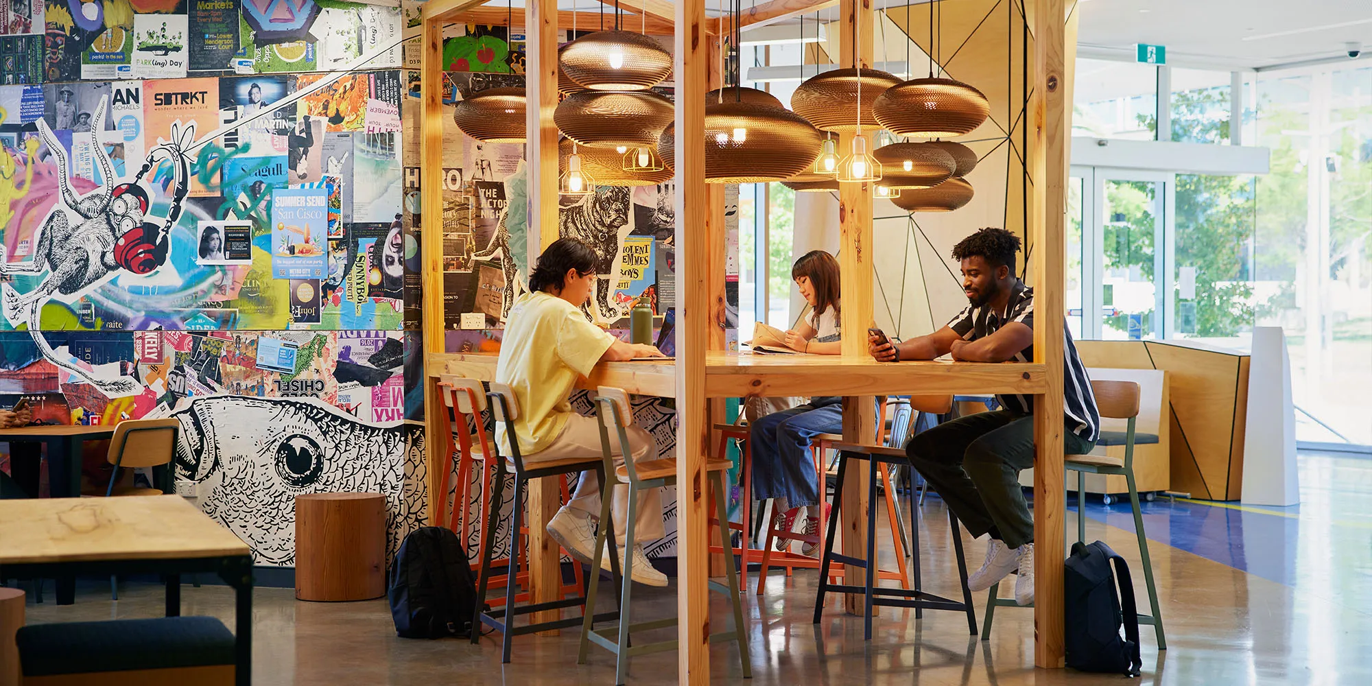 Students studying at the common tables in the medical school