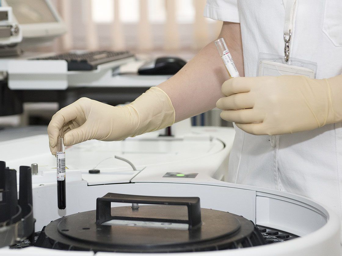 Lab technician in a lab with equipment