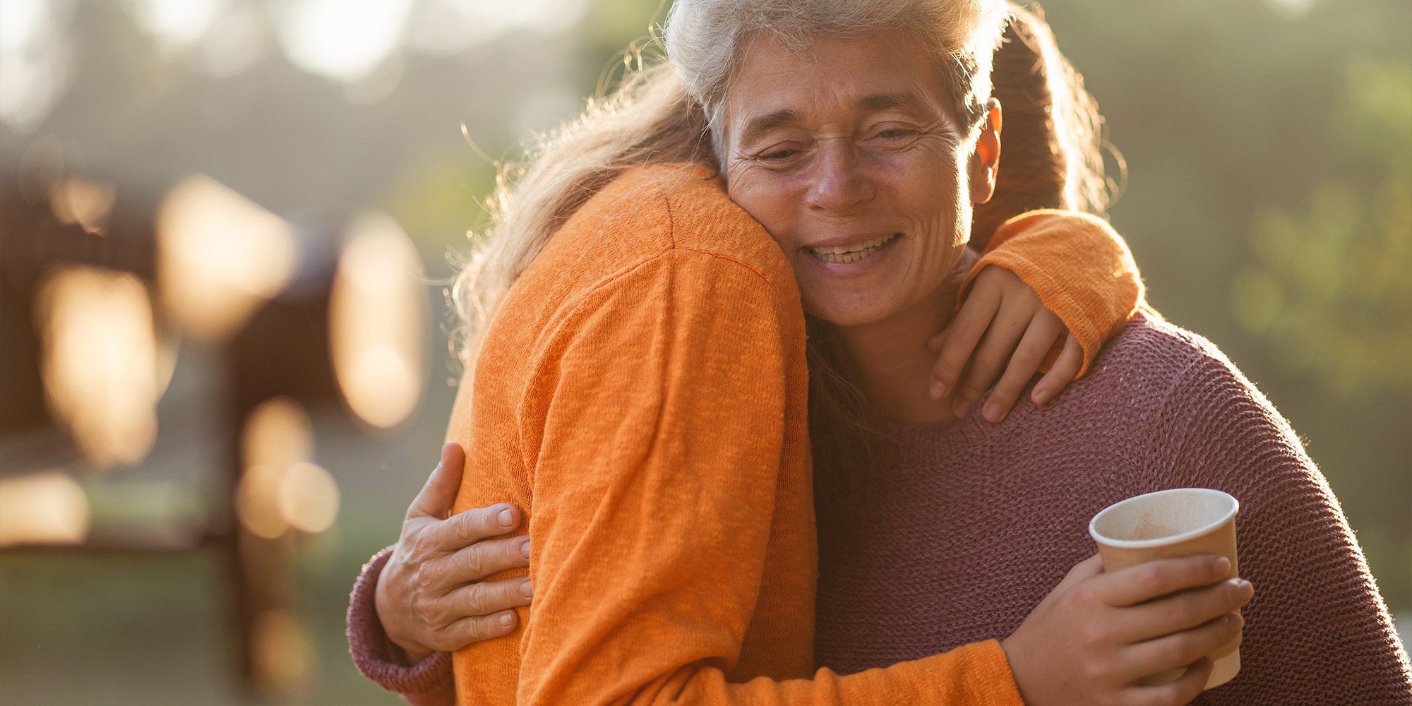 Student hugging parent/carer