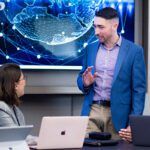 Postgraduate business students in tutorial