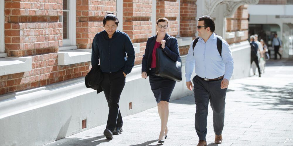 MBA students walking to city campus