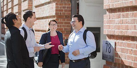 Group of MBA students outside 78 Murray Street Campus