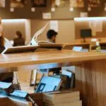 Design student reading a book - play video