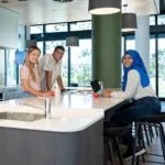 twin-dolphin-hall-students in the kitchen
