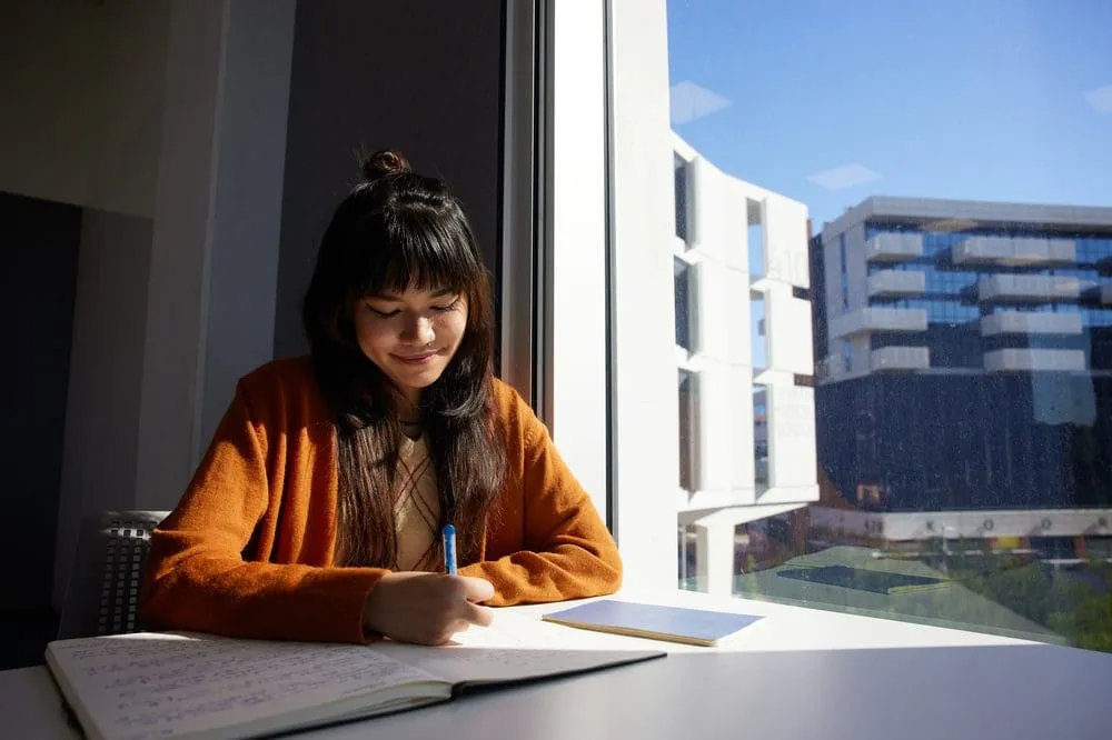 Female student in Curtin medical building