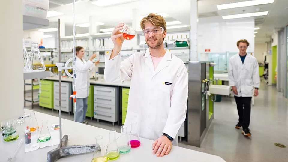 Curtin science student working in a laboratory