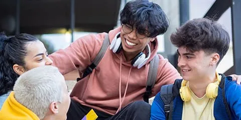 young male students with headsets