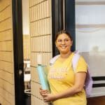 Culturally inclusive student in a yellow t-shirt