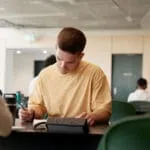Student in a yellow t-shirt